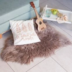 Unshorn Sheepskin Beige 2 ft. x 3 ft. Animal Shape Area Rug by Home Decorators Collection -Home Decoration Sales 2024 beige home decorators collection area rugs l201040100o2100 31 1000