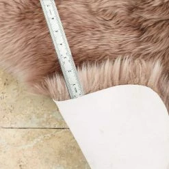 Unshorn Sheepskin Beige 2 ft. x 3 ft. Animal Shape Area Rug by Home Decorators Collection -Home Decoration Sales 2024 beige home decorators collection area rugs l201040100o2100 66 1000